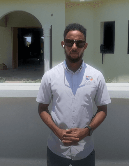 Mr Domuv portrait in Domuv branded shirt